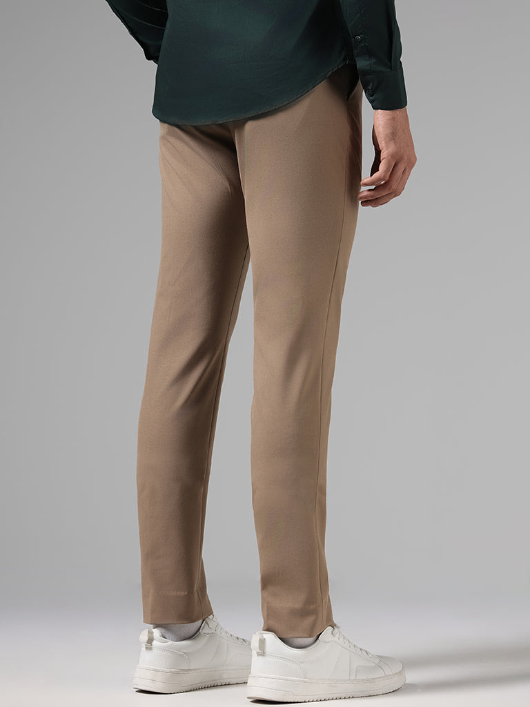 Westside WES Formals Men's Solid Dark Khaki Ultra Slim-Fit Mid-Rise Trousers for Work Wear Back View