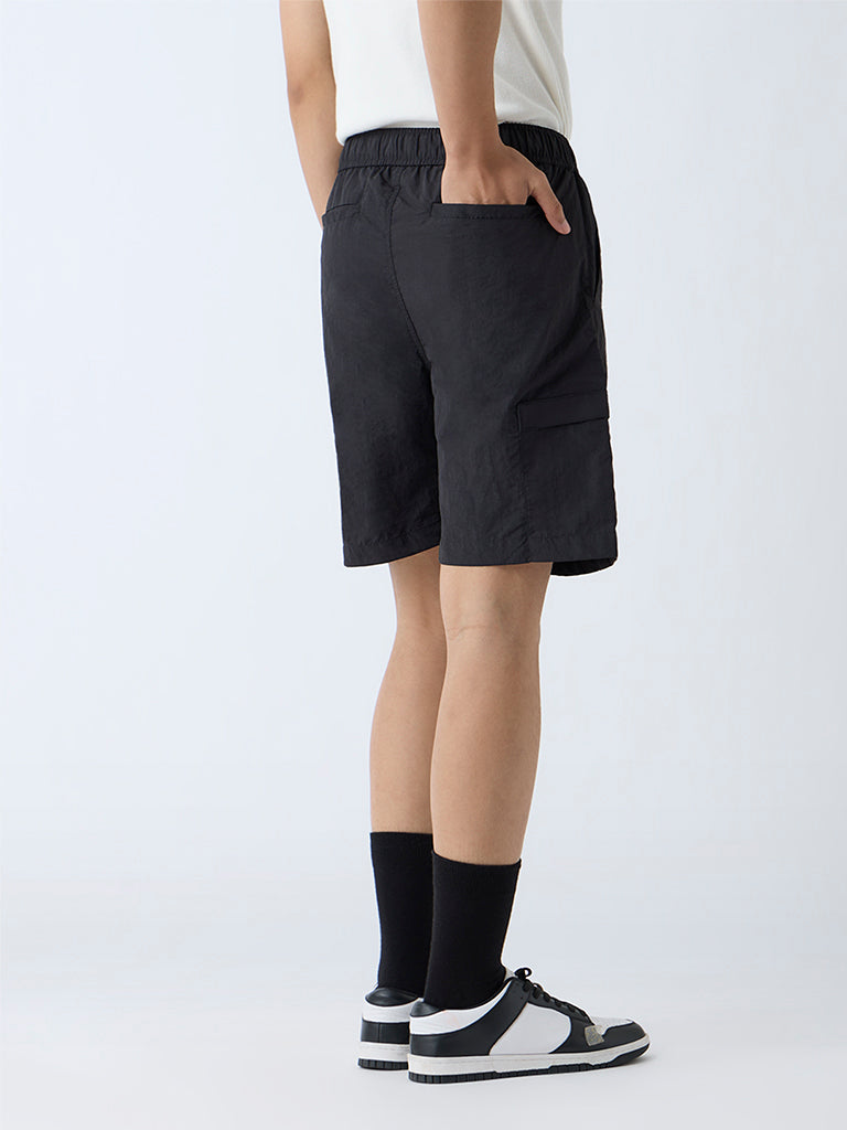Westside Studiofit Men's Black Solid Relaxed-Fit Mid-Rise Shorts for Sports Wear Back View