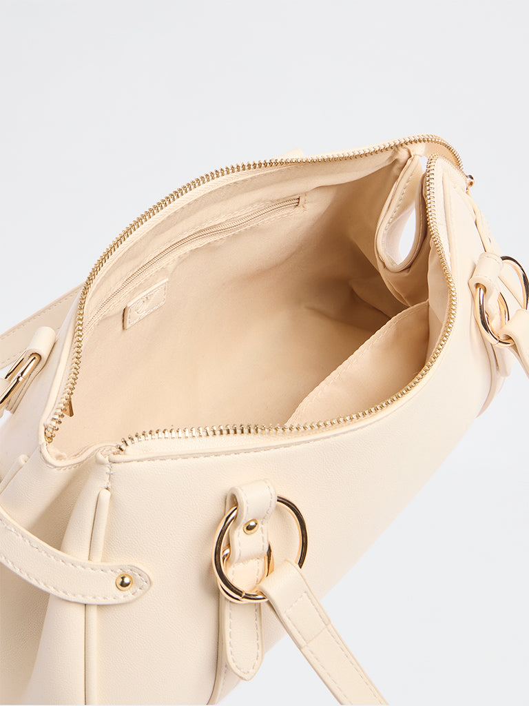 Westside Beige Textured Crescent Sling Bag