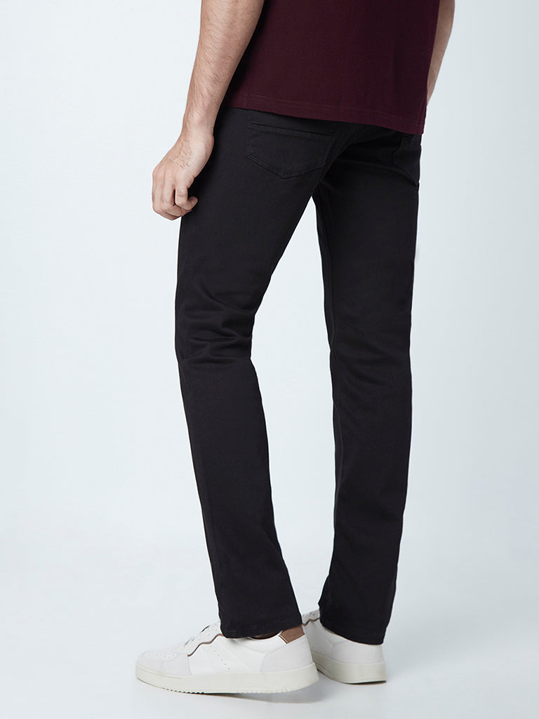 Westside Ascot Men's Black Relaxed-Fit Mid-Rise Jeans for Casual Wear Back View