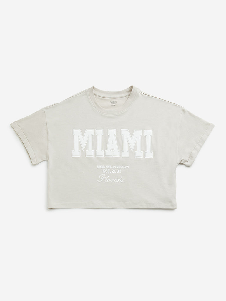 Westside Y&F Girl's Beige Text Design Cotton Crop T-Shirt for Casual Wear Front View