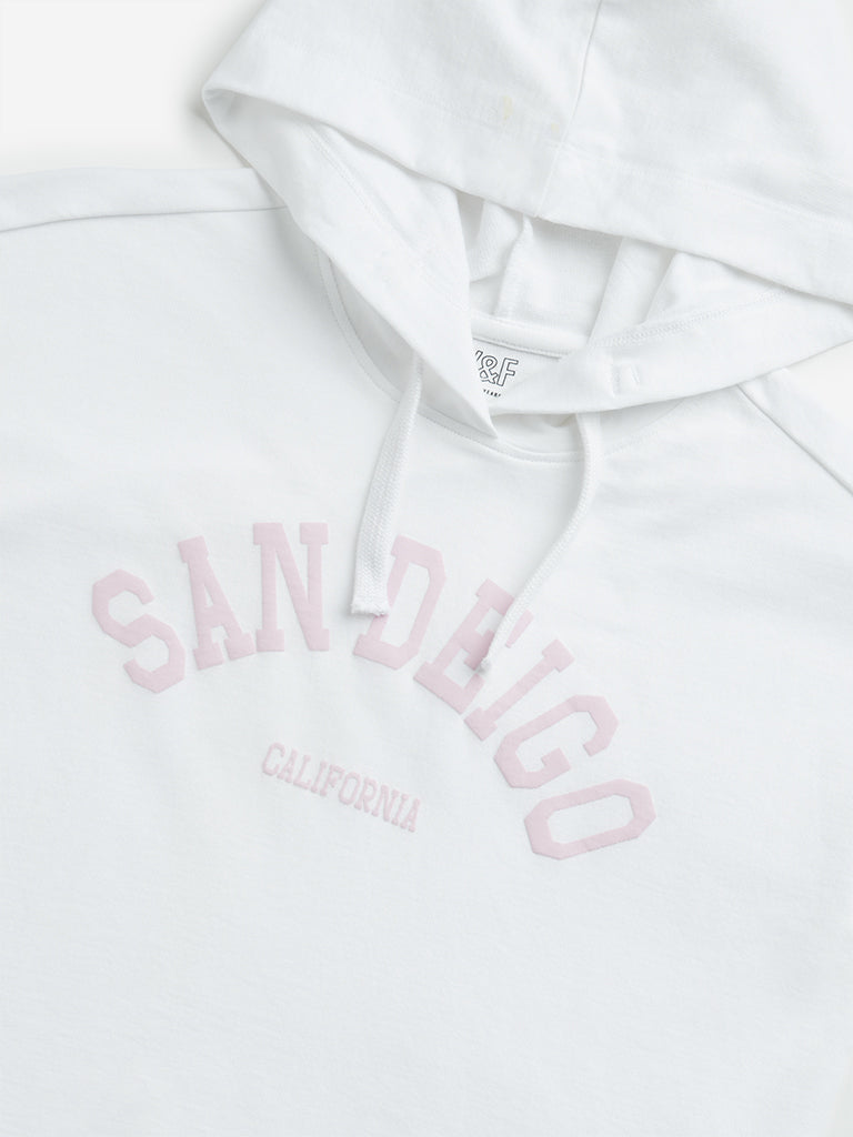 Westside Y&F Girl's White Text Print Hooded Cotton T-Shirt for Casual Wear Zoomed View