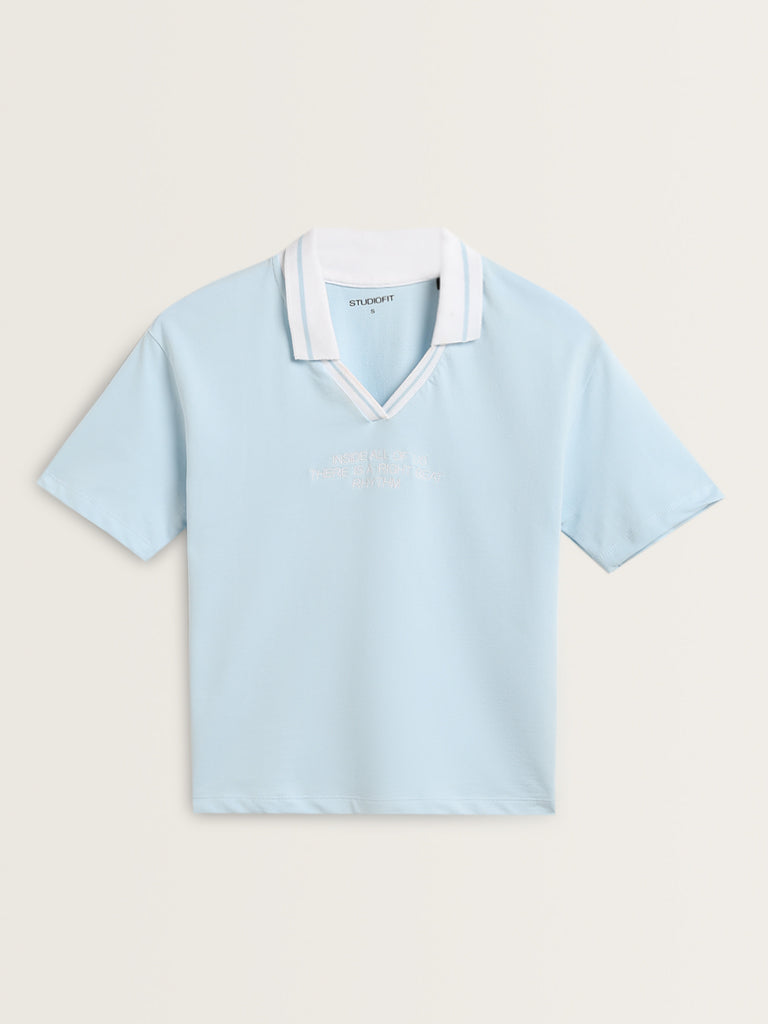 Westside Studiofit Women's Light Blue Text Design Collared Cotton T-Shirt for Sports Wear Flatly Front view