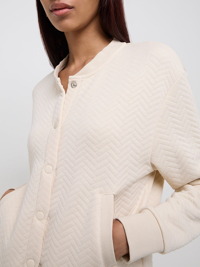 Westside Studiofit Women's Beige Chevron Textured Cotton-Blend Jacket for Sports Wear Zoomed View