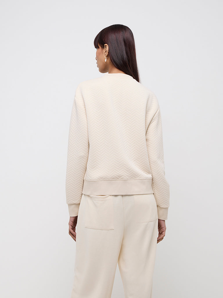 Westside Studiofit Women's Beige Chevron Textured Cotton-Blend Jacket for Sports Wear Back View