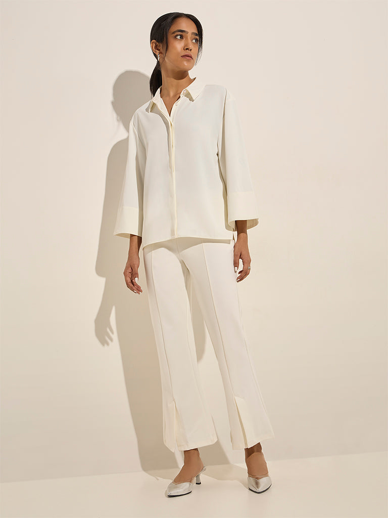 Westside Wardrobe Women's Off-White Slit-Detailed High-Rise Bootcut Trousers for Work Wear Full View