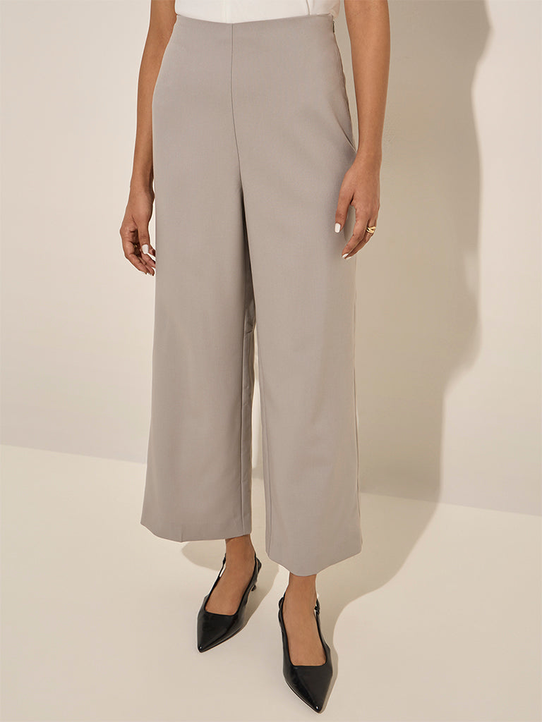 Westside Wardrobe Women's Grey High-Rise Flared Trousers for Work Wear Front View