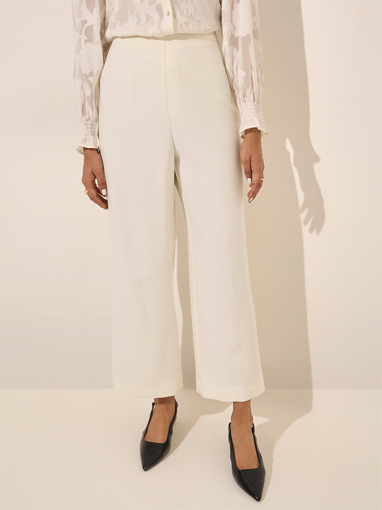 Westside Wardrobe Women's Ivory High-Rise Flared Trousers for Work Wear Front View