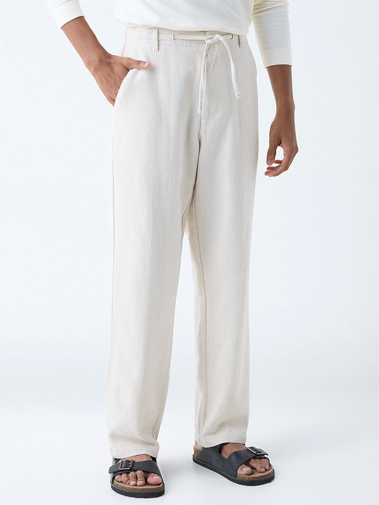 Westside ETA Men's Off-White Textured Relaxed-Fit Mid-Rise Cotton Chinos for Casual Wear Front View