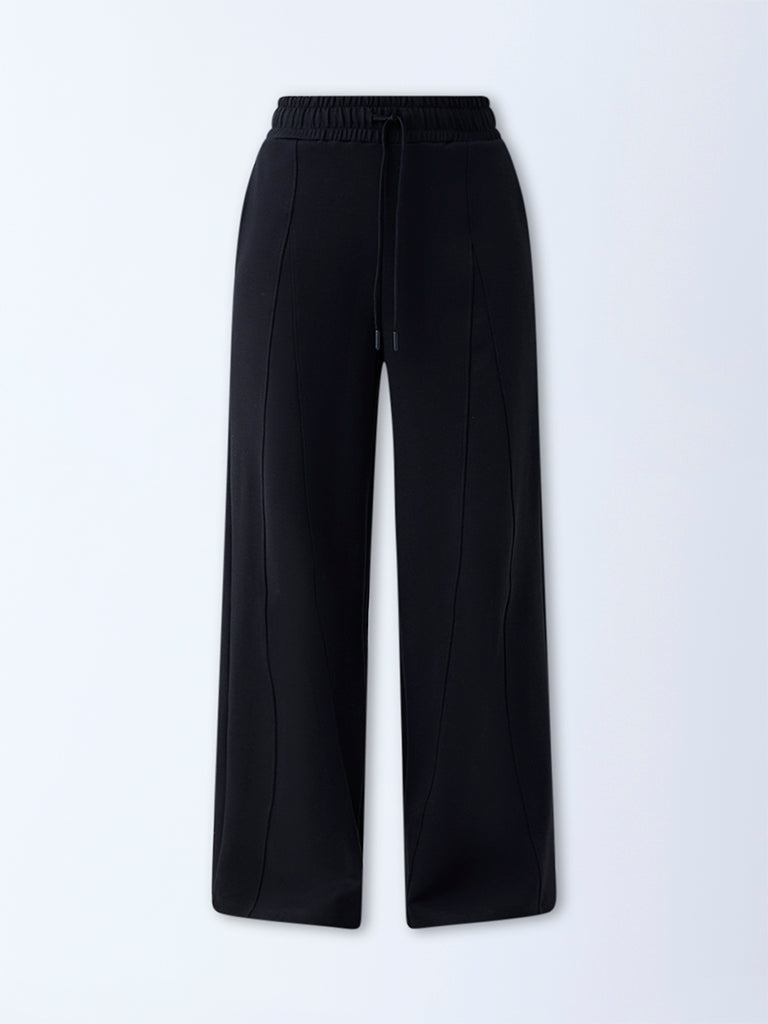 Westside Studiofit Women's Black Solid High-Rise Track Pants for Sports Wear Flatly