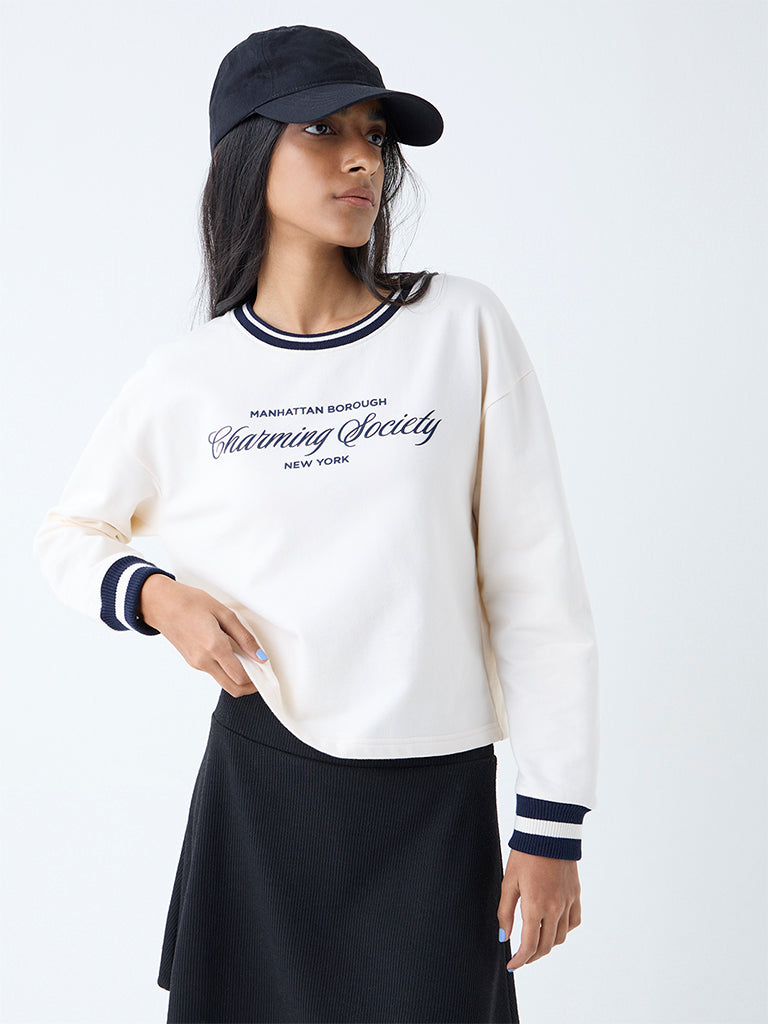 Westside Studiofit Women's Cream Text Detailed Cotton Sweatshirt for Winter Wear Front view