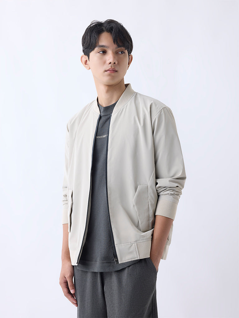 Westside Studiofit Men's Beige Solid Relaxed-Fit Jacket for Sports Wear Front view