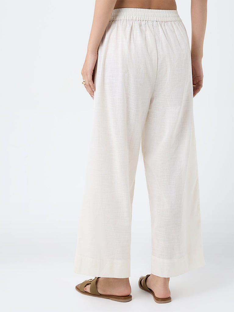 Utsa Off-White Floral Embroidered Cotton Pants
