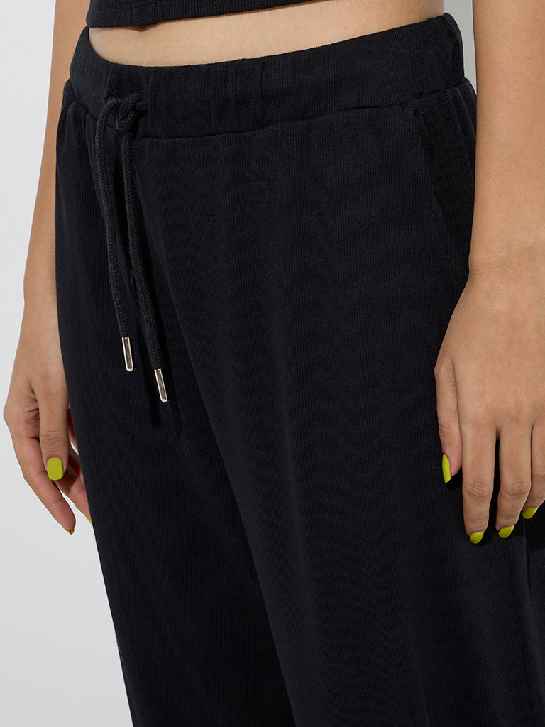 Superstar Black Ribbed High-Rise Cotton-Blend Pants
