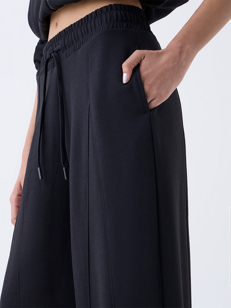 Studiofit Black Solid High-Rise Flared Pants
