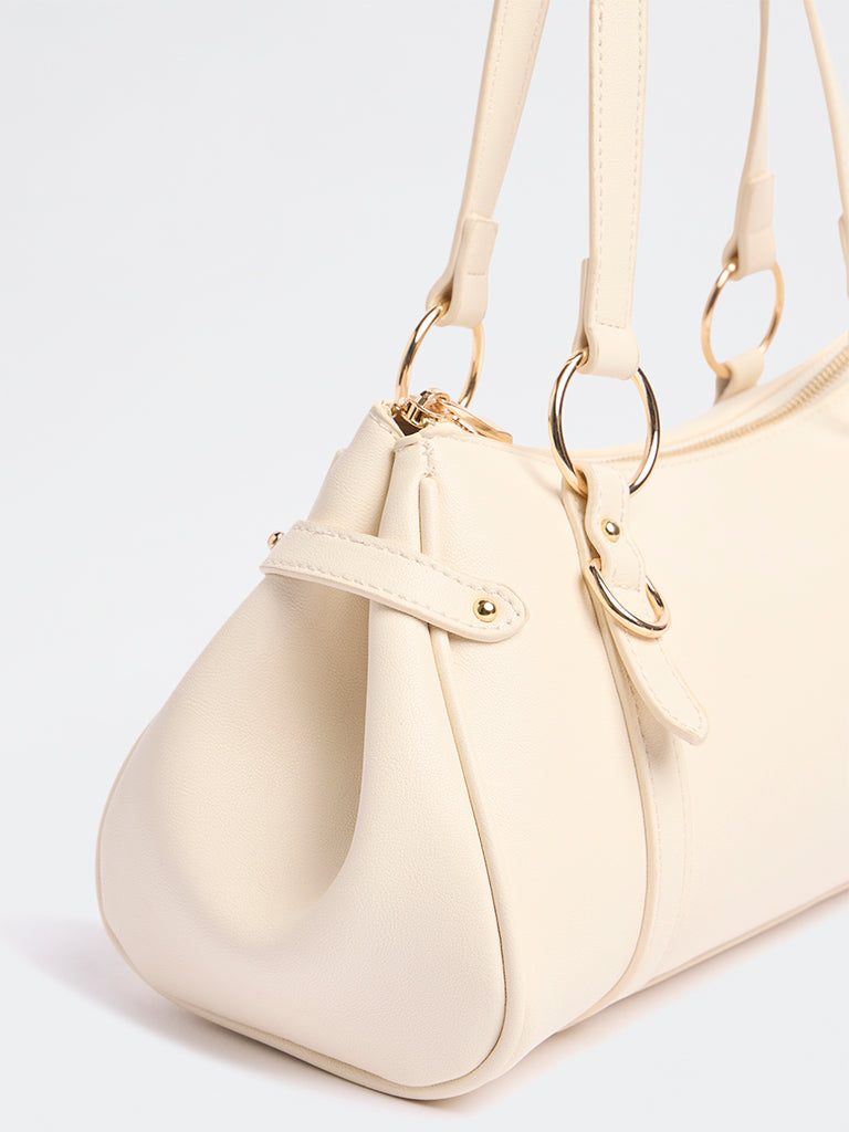 Westside Beige Textured Crescent Sling Bag