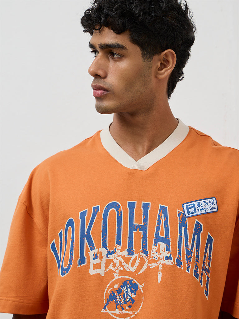 Nuon Orange Text Printed Oversized T-Shirt