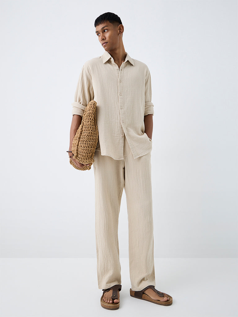 ETA Off-White Textured Relaxed-Fit Mid-Rise Cotton Chinos