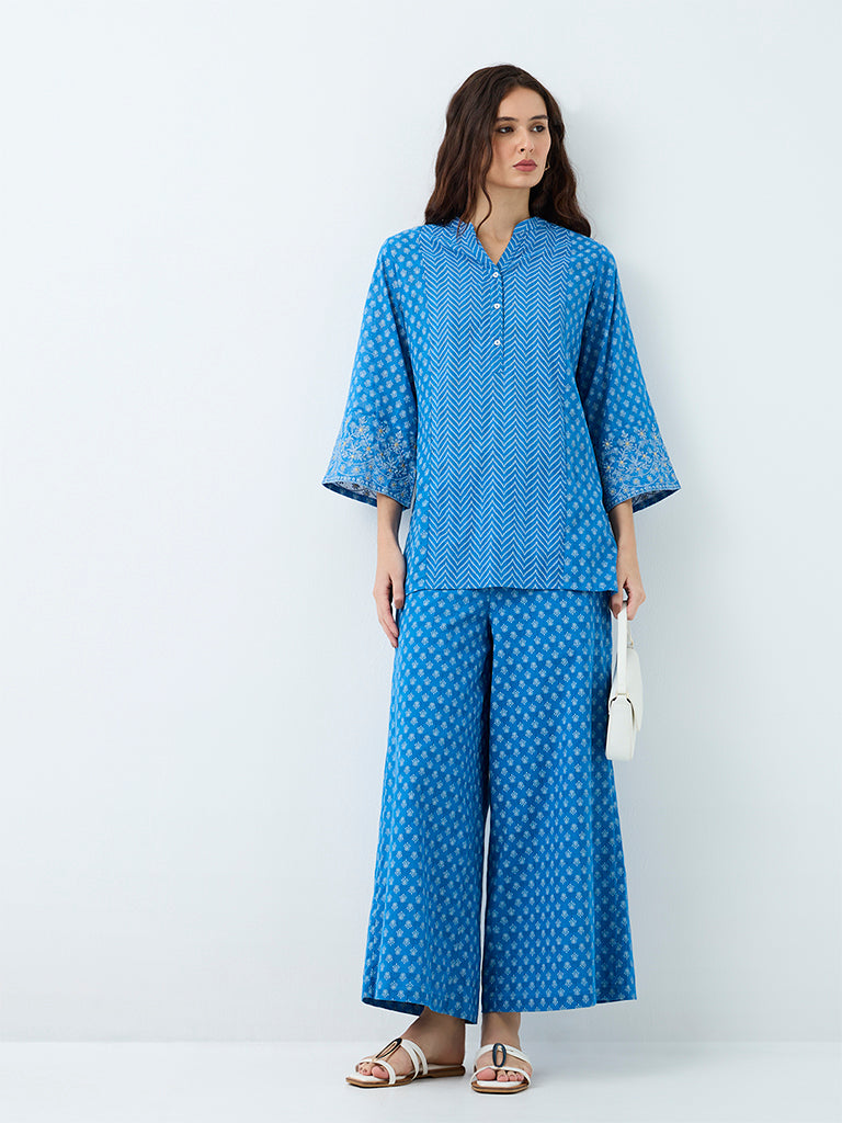 Utsa Blue Floral Printed Cotton-Blend Pants