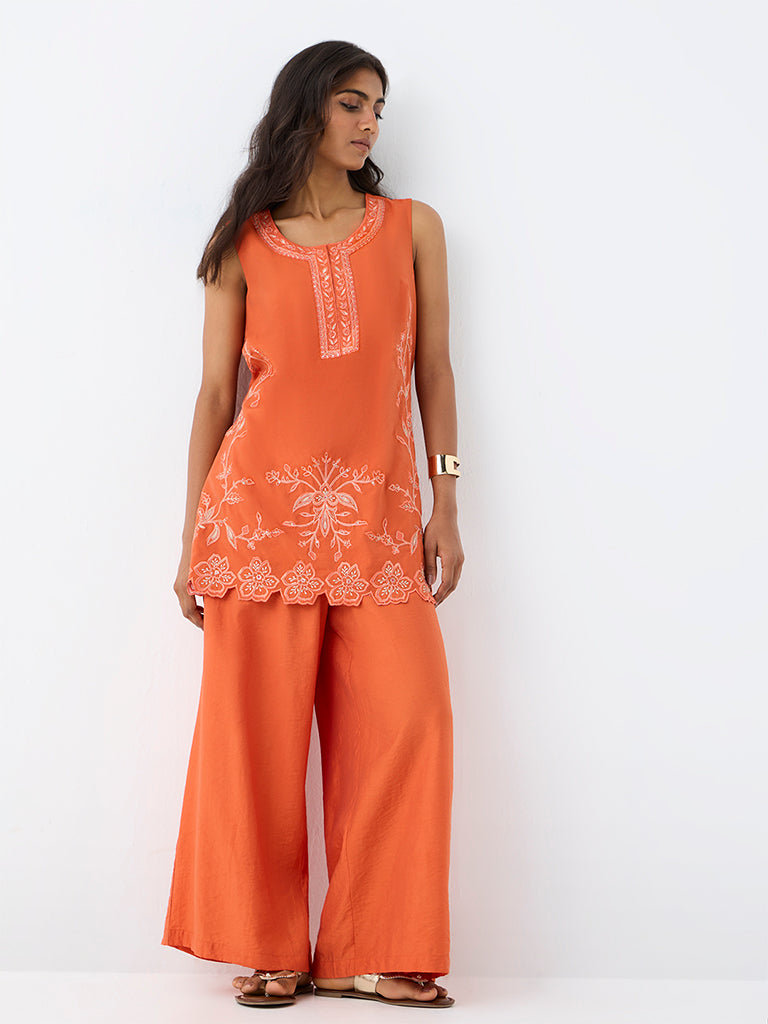 Utsa Orange Solid Cotton-Blend Palazzos