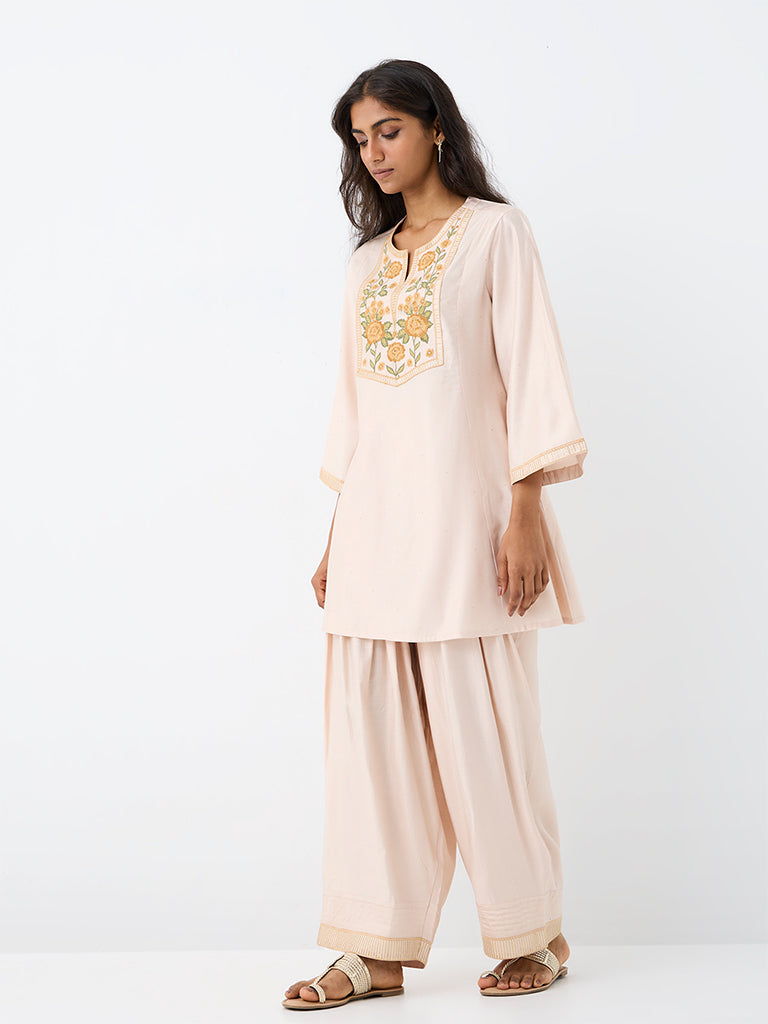 Utsa Light Peach Floral Embroidered Kurti