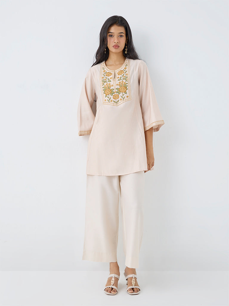 Utsa Light Peach Floral Embroidered Kurti