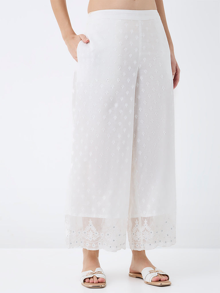 Utsa White Floral Embroidered Cotton Pants