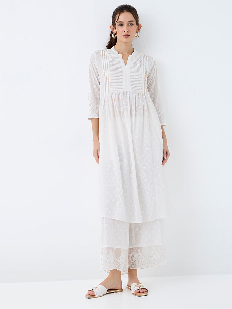 Utsa White Floral Embroidered Cotton Pants