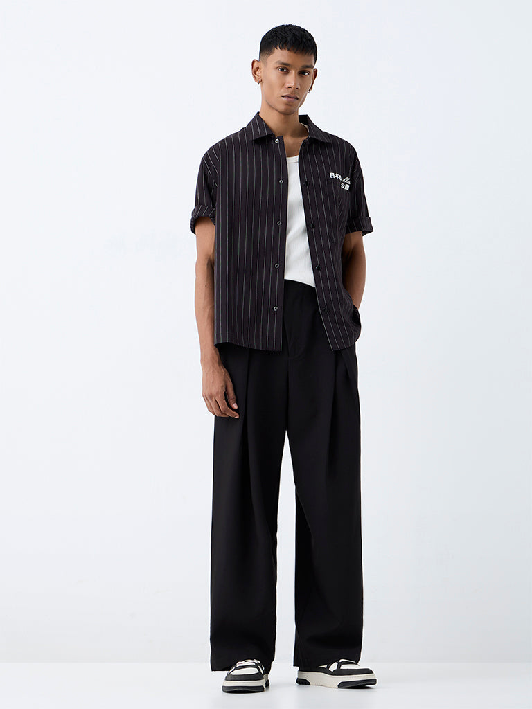 Nuon Black Pleated Loose-Fit Mid-Rise Cotton Trousers