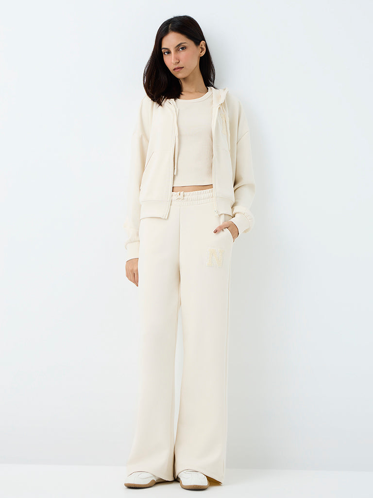 Nuoflexx Off-White Embroidered Flared High-Rise Track Pants