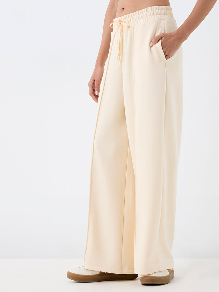 Nuoflexx Cream Solid High-Rise Track Pants