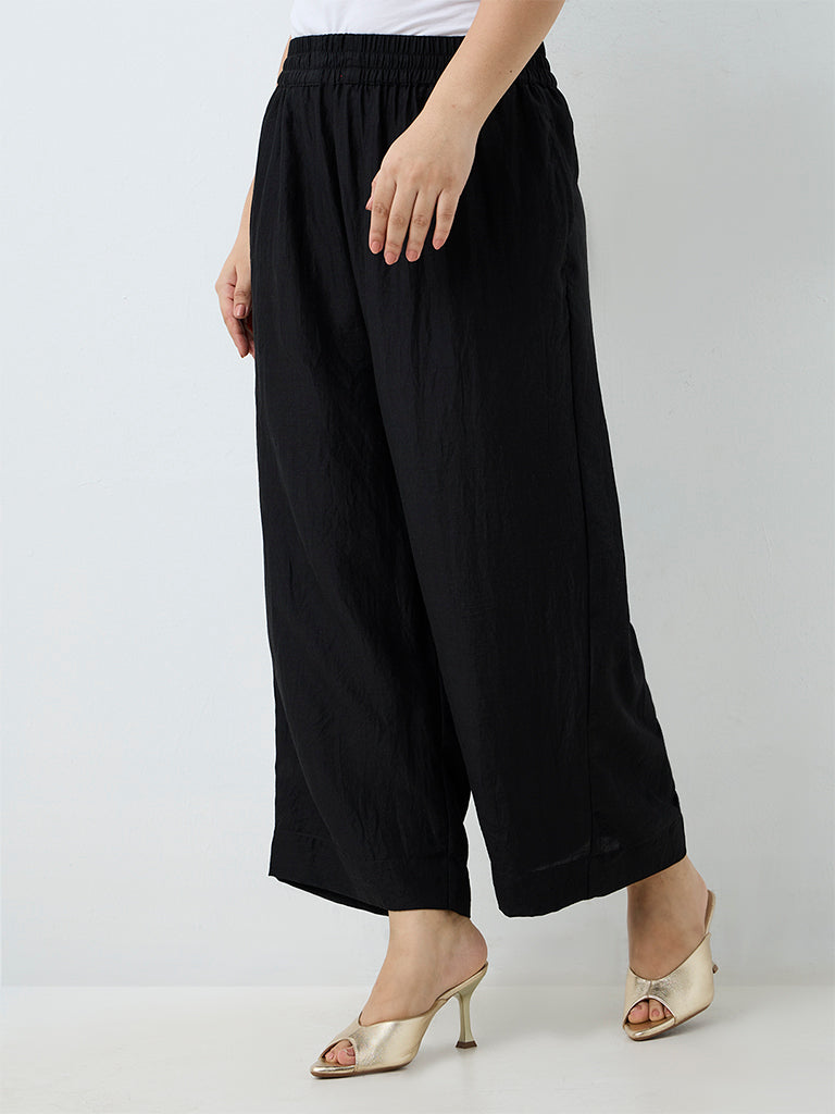 Diza Black Solid Cotton-Blend  Pants