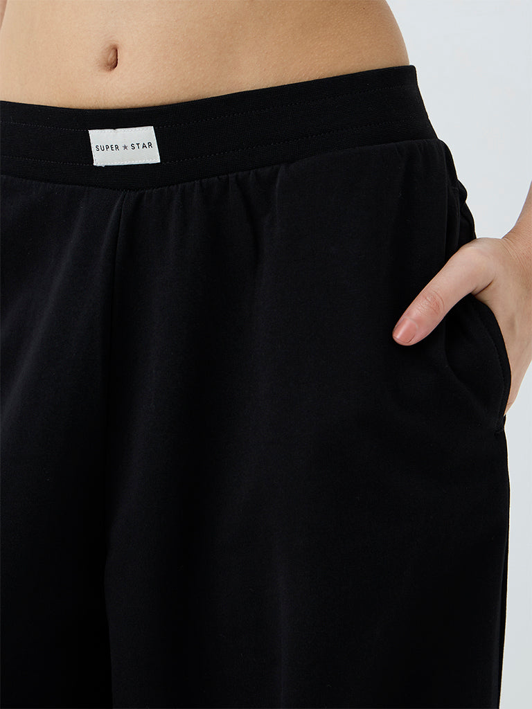 Superstar Black Solid High-Rise Parachute Pants