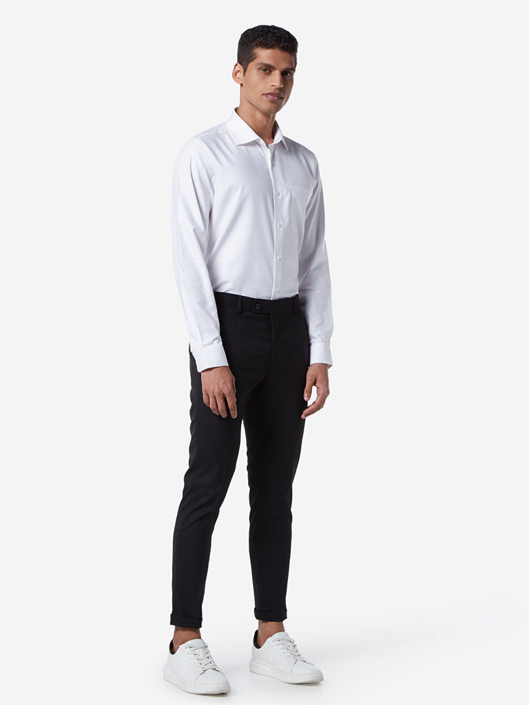 WES Formals Black Carrot Fit Trousers Standing View